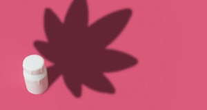 Illustration of a medicine bottle that casts a shadow of a marijuana leaf on a pink background with ...