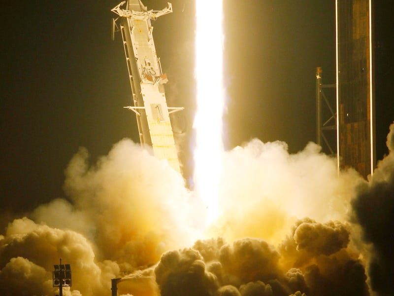 CAPE CANAVERAL, FLORIDA - NOVEMBER 10: SpaceX Falcon 9 rocket with the Crew Dragon spacecraft lifts...
