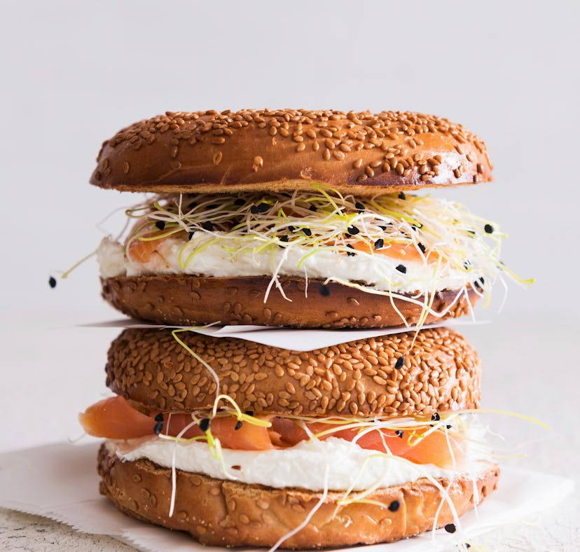 Sesame seed bagels with salmon, bean sprouts and cream cheese