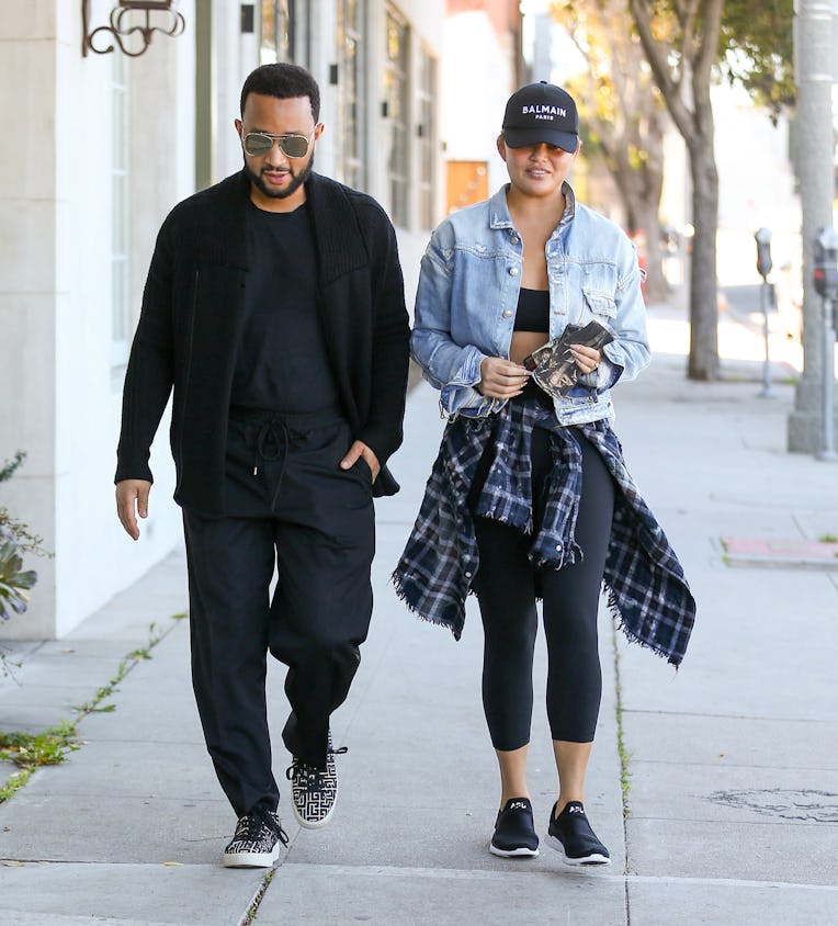LOS ANGELES, CA - JANUARY 11: John Legend and Chrissy Teigen are seen on January 11, 2022 in Los Ang...
