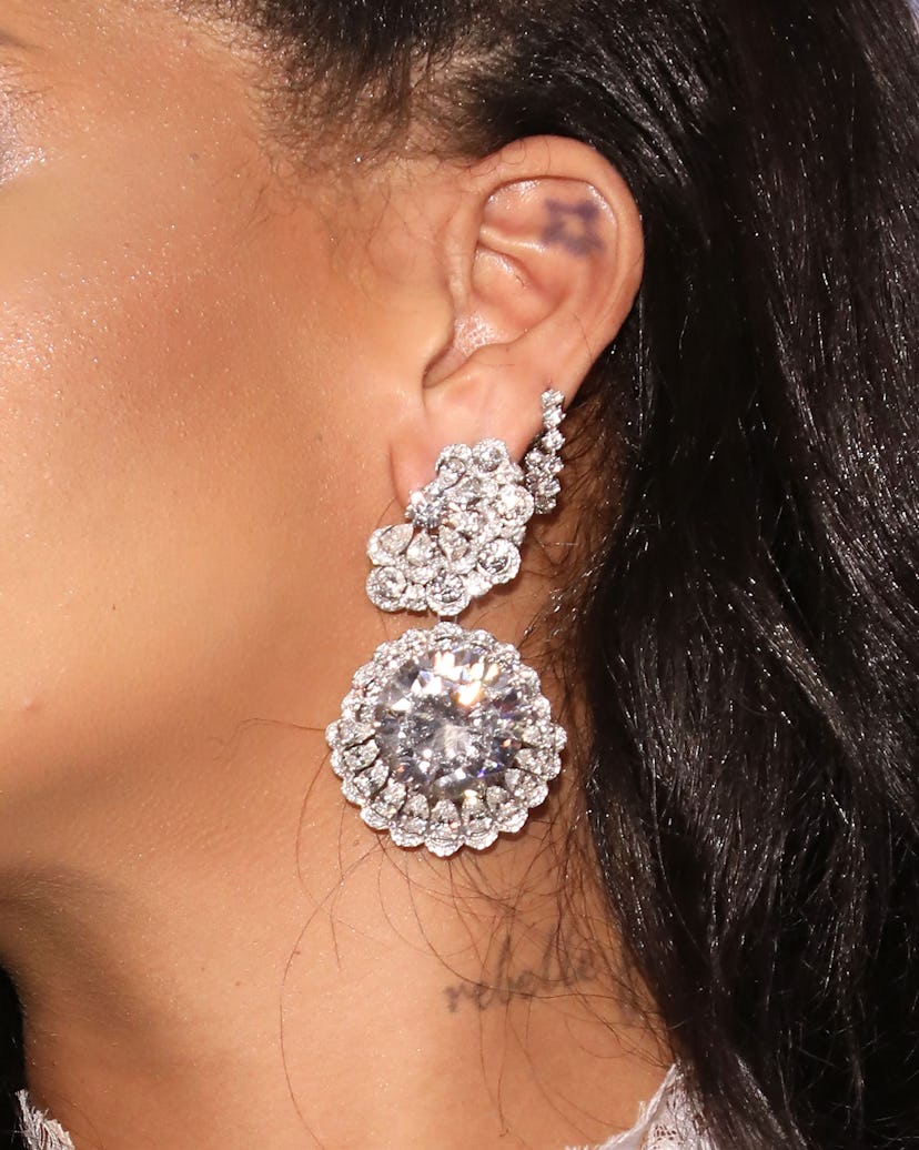 Rihanna has a star tattoo on her left ear.