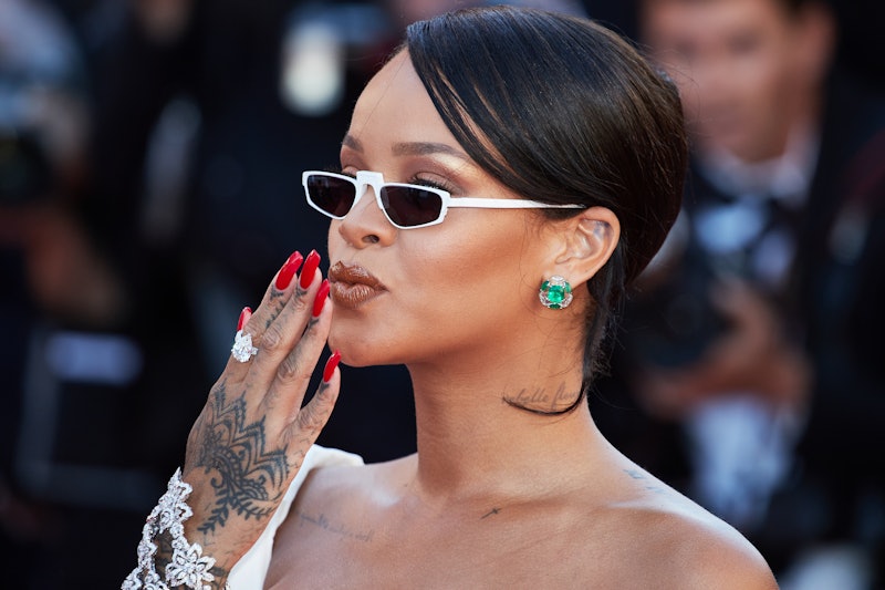 Rihanna has over 20 tattoos — from traditional hand tattoos to a large Egyptian goddess..