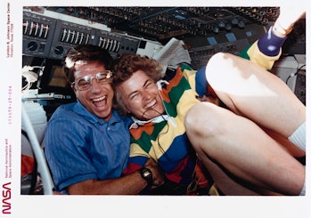 American NASA astronaut John E Blaha and American NASA astronaut Shannon W Lucid laughing and smilin...