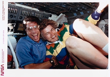 American NASA astronaut John E Blaha and American NASA astronaut Shannon W Lucid laughing and smilin...