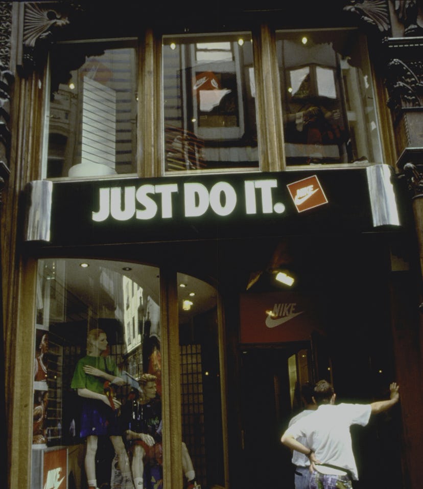 Entrance to Nike store, w. slogan just do it in English over door. (Photo by Serge Attal/Getty Im...