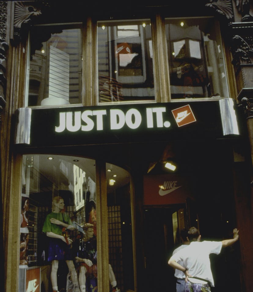 Entrance to Nike store, w. slogan just do it in English over door.    (Photo by Serge Attal/Getty Im...