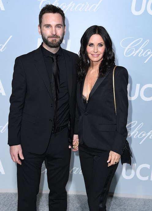 LOS ANGELES, CALIFORNIA - FEBRUARY 21: Johnny McDaid and Courteney Cox arrives at the Hollywood For...
