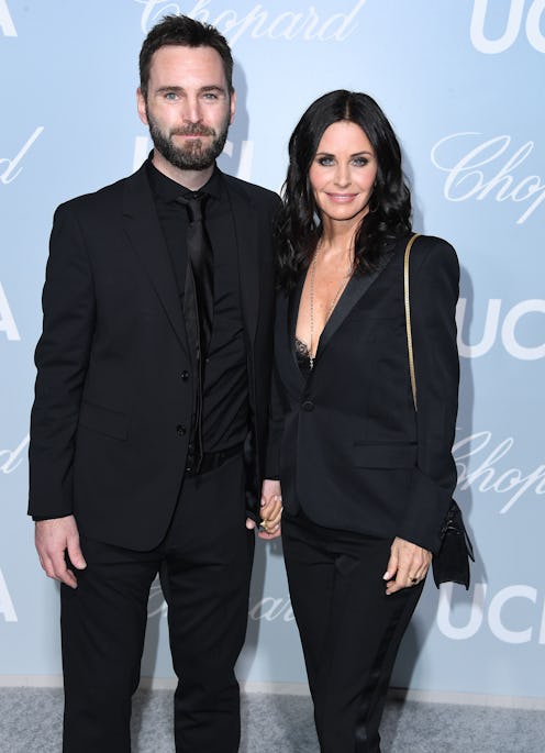 LOS ANGELES, CALIFORNIA - FEBRUARY 21:  Johnny McDaid and Courteney Cox arrives at the Hollywood For...
