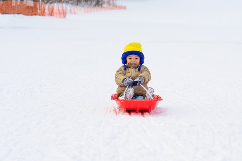 Use this snow day Instagram caption to accompany photos of your kids sledding.