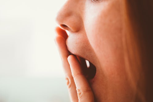 Cropped shot of a woman covering her mouth with her hand - 
Worried, emotional stress, not speaking,...