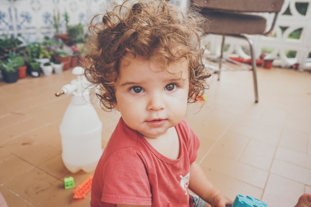 little girl with curly hair