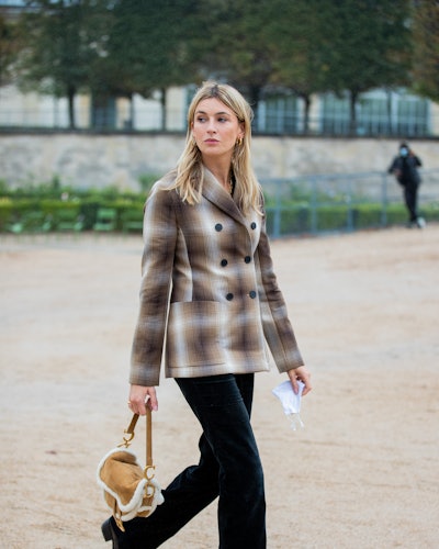 Camille Charriere with baguette hobo bag