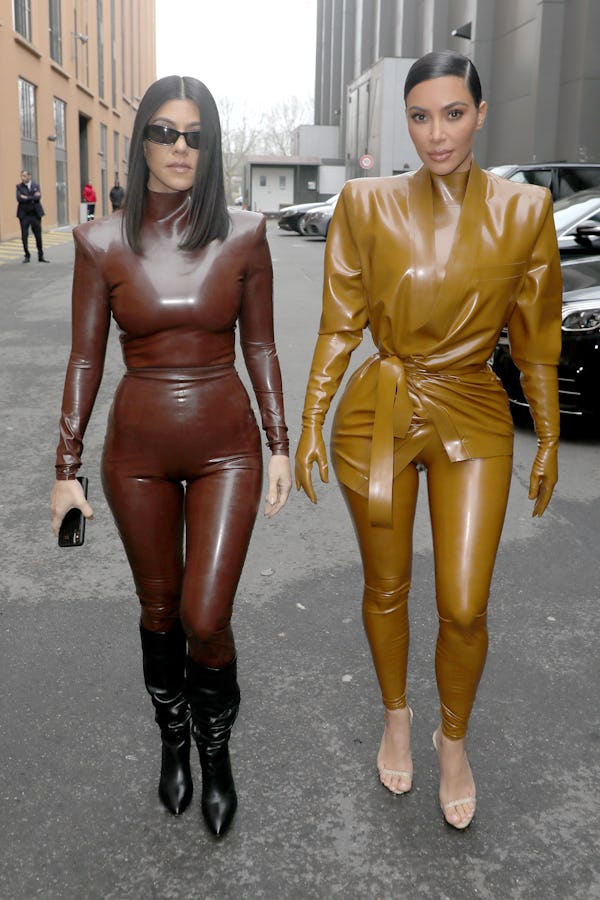 PARIS, FRANCE - MARCH 01: (EDITORIAL USE ONLY) Kourtney and Kim Kardashian attend the Balenciaga sho...