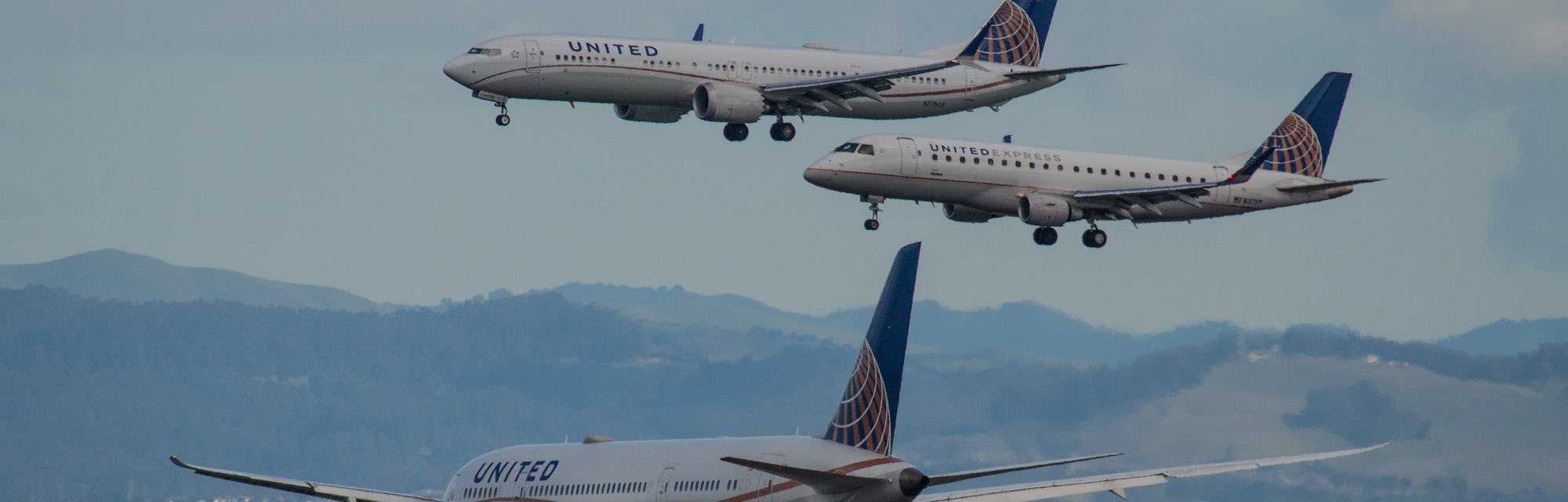 San Francisco, CA, USA - February 11, 2019: At San Francisco International Airport (SFO), two United...