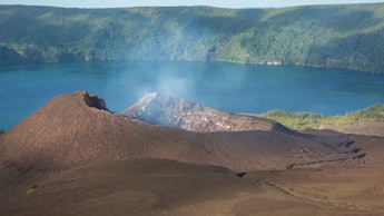 Tofua is an island in Tonga. There is an active volcano with a lava crater and a lake inside the cal...