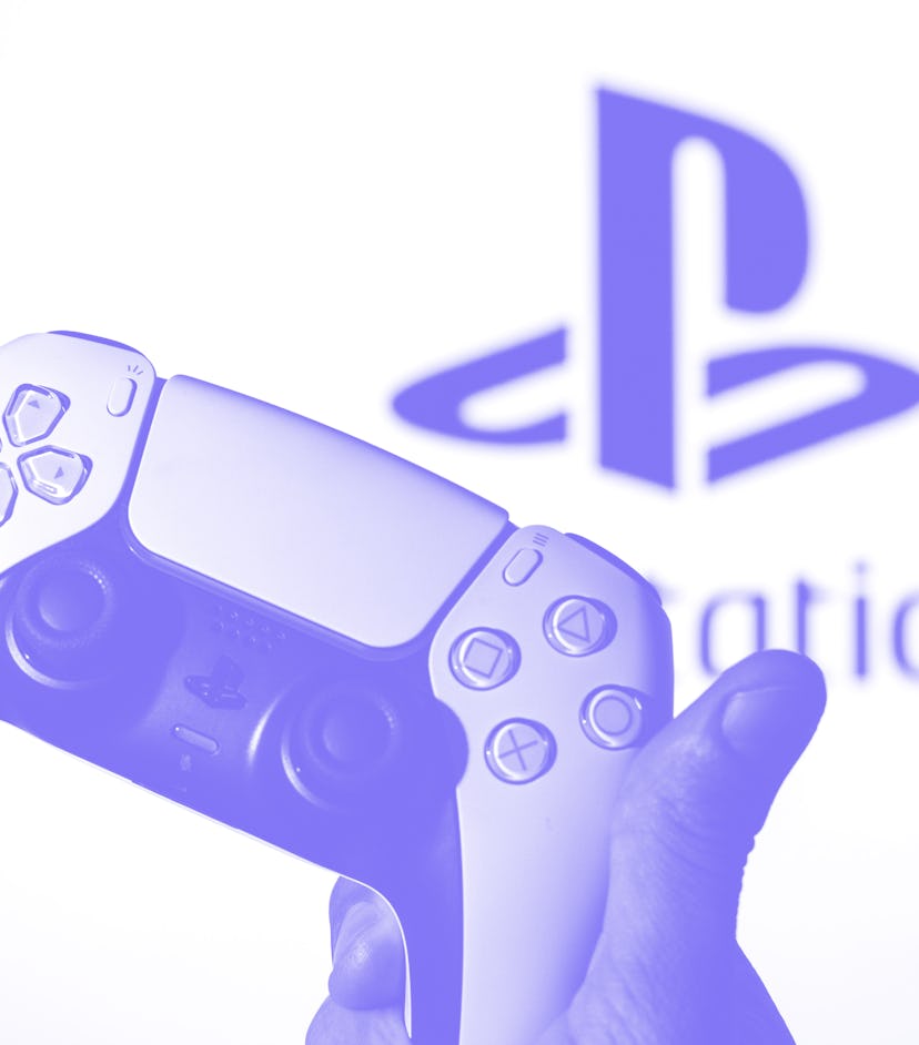 SPAIN - 2021/11/08: In this photo illustration, a PlayStation 5 controller seen with a PlayStation l...