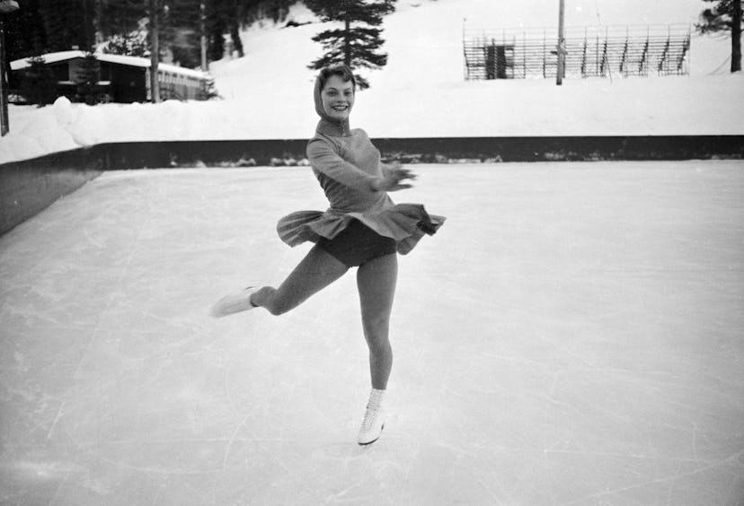 World Figure Skating Champion Carol Heiss, New York City, goes through her paces in the Squaw Valley...