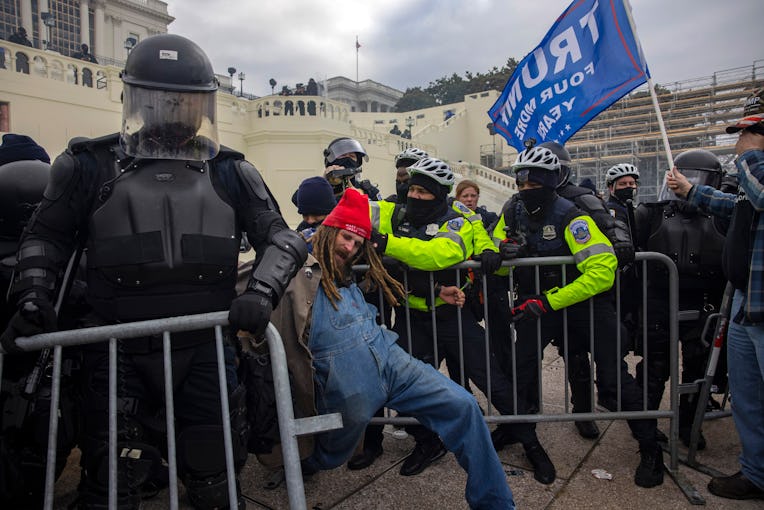 WASHINGTON, DC - JANUARY 06: Trump supporters clash with police and security forces as people try to...