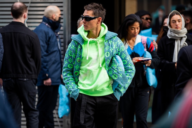 PARIS, FRANCE - JANUARY 20:  Evan Mock is seen wearing neon hoody, cardigan, black pants outside Lou...