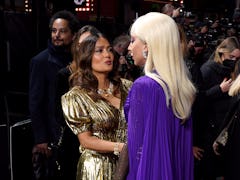 Salma Hayek and Lady Gaga (right) attending the House of Gucci UK Premiere, held at the Odeon Leices...
