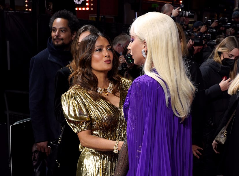 Salma Hayek and Lady Gaga (right) attending the House of Gucci UK Premiere, held at the Odeon Leices...