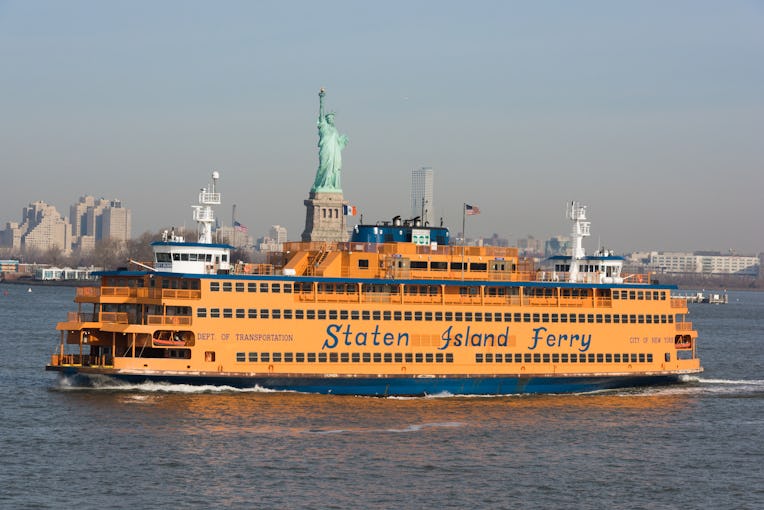 New York, USA – Feb 27th, 2017: The Staten Island Ferry crossing the bay early in the day with the S...