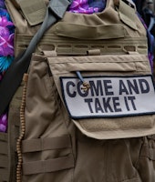 VIRGINIA, USA - JANUARY 17: A patch on a tactical vest is seen during a gun rights rally outside of ...