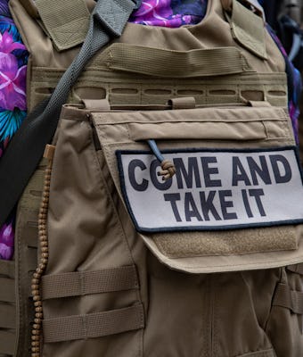 VIRGINIA, USA - JANUARY 17: A patch on a tactical vest is seen during a gun rights rally outside of ...