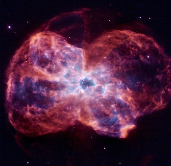 The star is ending its life by casting off its outer layers of gas, which formed a cocoon around the...
