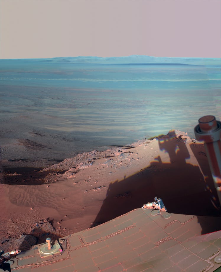 NASA's Mars Rover Opportunity catches its own late-afternoon shadow in this dramatically lit view ea...