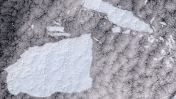 SOUTH GEORGIA ISLAND - 1 JANUARY 2021: Shattered Iceberg A-68A near South Georgia Island. (Photo by ...