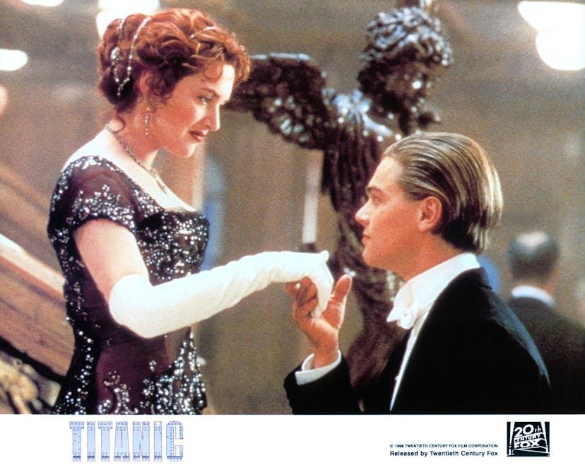 Kate Winslet offers her hand to Leonardo DiCaprio in a scene from the film 'Titanic', 1997. (Photo b...