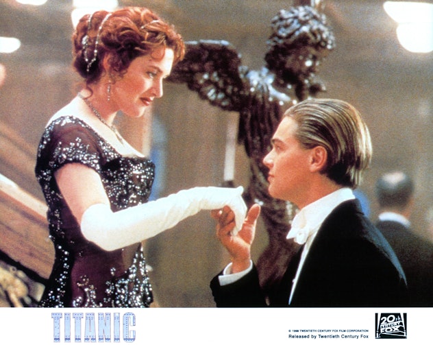 Kate Winslet offers her hand to Leonardo DiCaprio in a scene from the film 'Titanic', 1997. (Photo b...