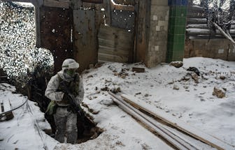 AVDIIVKA, UKRAINE - JANUARY 24: Ukrainian servicemen from the 25th Air Assault Battalion are seen st...