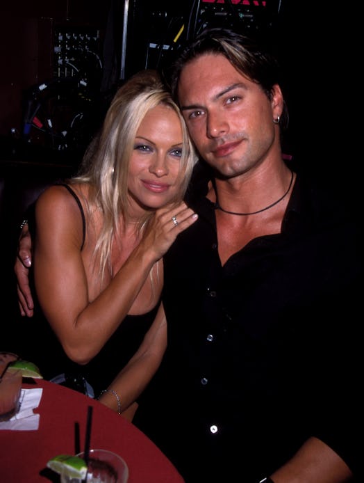 Pamela Anderson and Marcus Schenkenberg (Photo by Barry King/WireImage)
