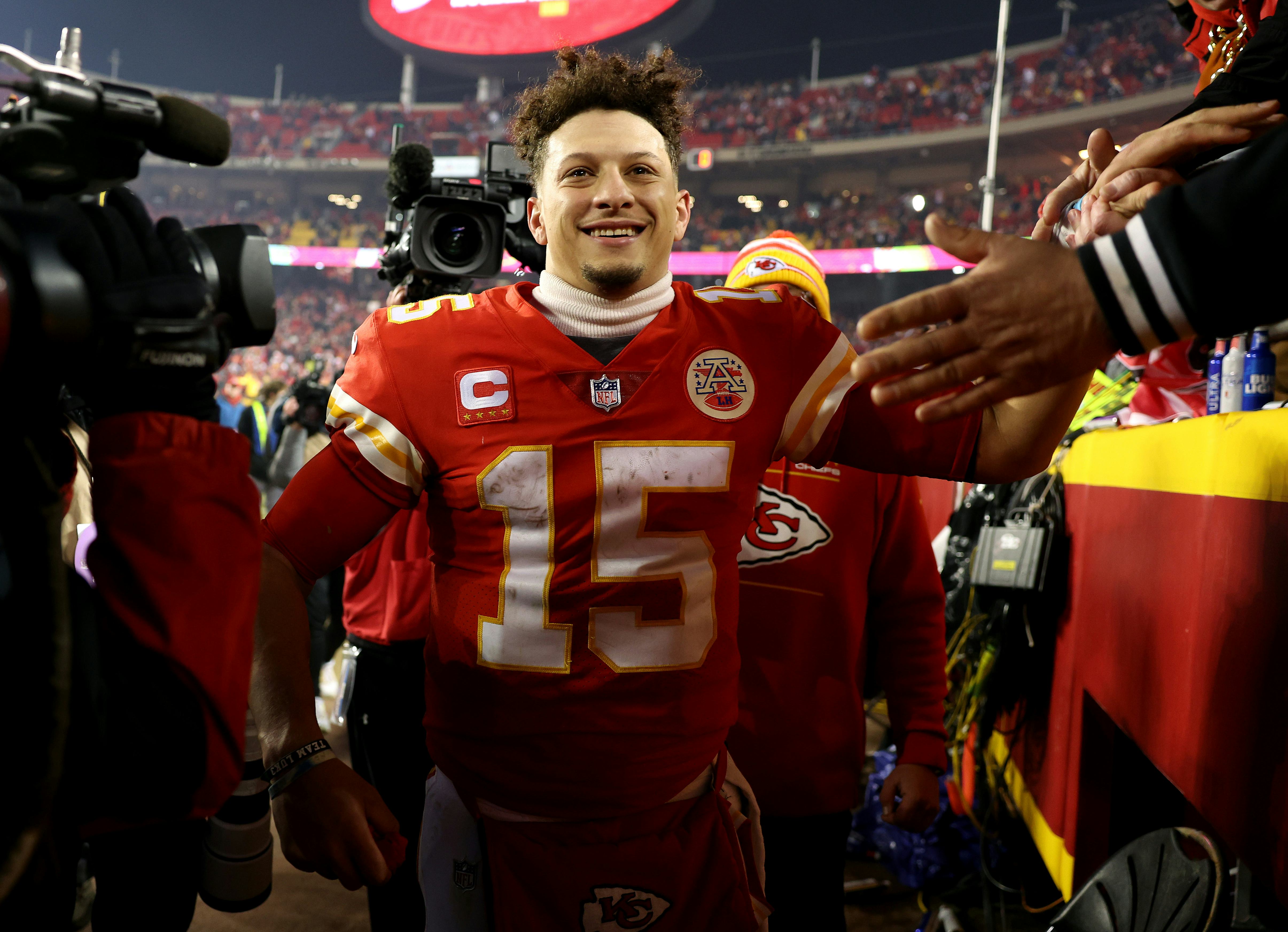 KANSAS CITY, MISSOURI - JANUARY 23: Patrick Mahomes #15 of the Kansas City Chiefs celebrates with fa...