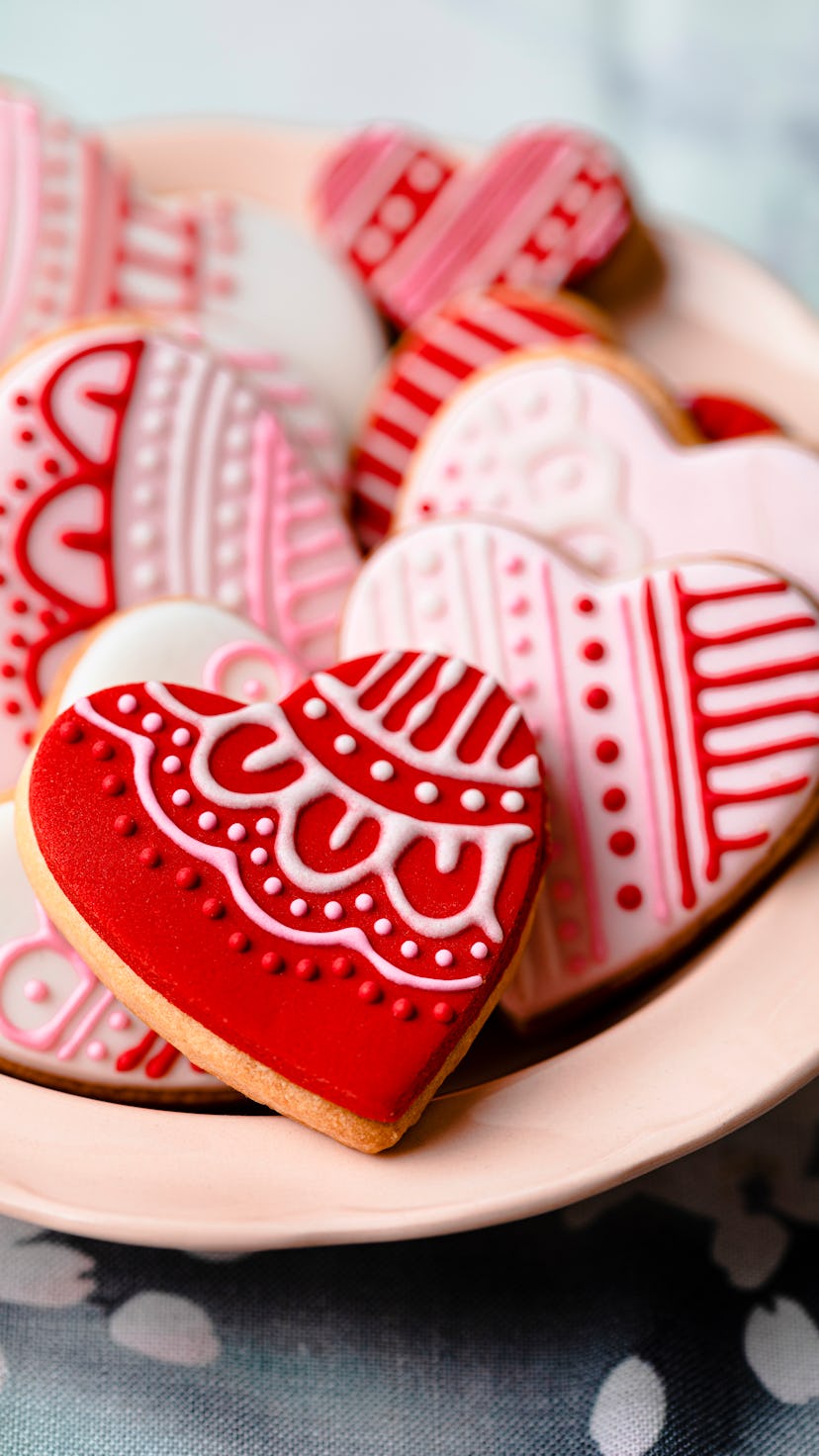 Heart-shaped decorated cookies for tea, studio shot.