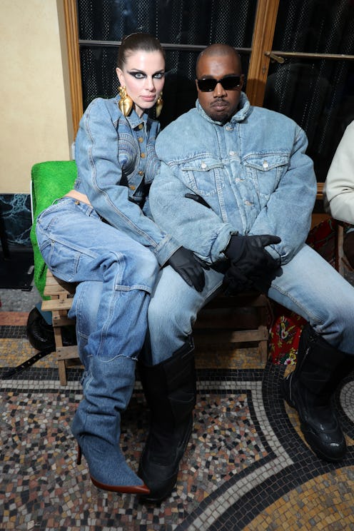 Julia Fox and Kanye West in matching denim looks at the Kenzo show in Paris January 23, 2022.