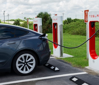 Miami, Florida, USA - August 29, 2021:  Tesla Model Y electric car at Tesla Supercharger charging st...