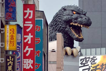 The head of Godzilla on top of a large hotel in Shinjuku, Tokyo - Japan
