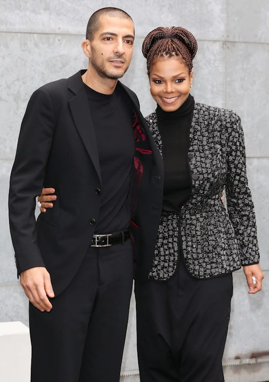 Wissam al Mana and Janet Jackson attend the Giorgio Armani fashion show during Milan Fashion Week on...