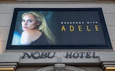LAS VEGAS, NV - JANUARY 9:  A promotional billboard touting the upcoming concerts by singer Adele is...