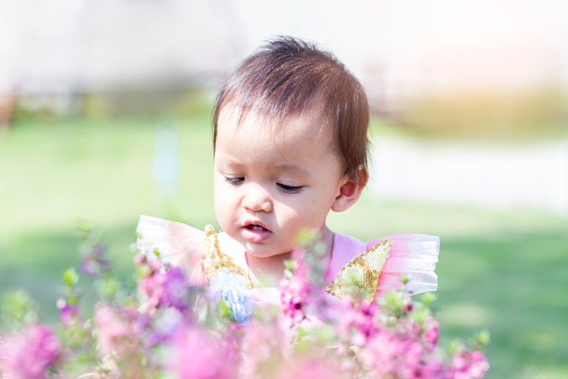 baby girl with flowers