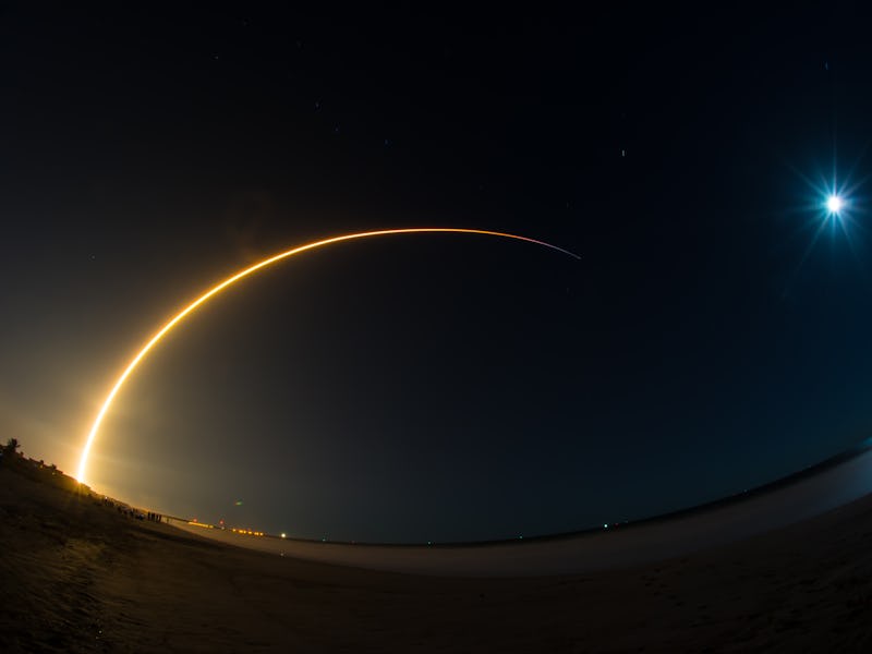 SpaceX's 50th Falcon 9 rocket launches from Cape Canaveral, Florida, as the moon looks on, March 6, ...