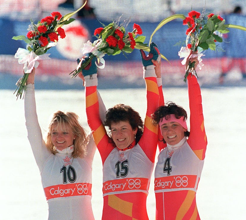 Swiss skier Vreni Schneider (C), flanked by compatriot Maria Walliser (R) and West German Christa Ki...