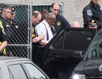 Bill Cosby is taken out of the Montgomery County Courthouse to state prison in shackles after being ...