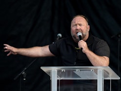 US far-right radio show Alex Jones speaks to supporters of US President Donald Trump as they demonst...
