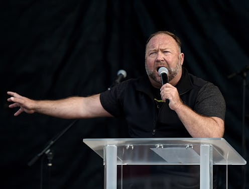 US far-right radio show Alex Jones speaks to supporters of US President Donald Trump as they demonst...