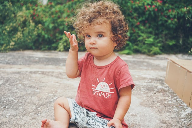 baby girl with curly hair