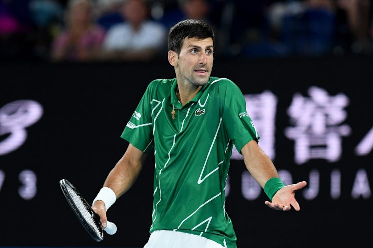 MELBOURNE, AUSTRALIA - JANUARY 28: Novak Djokovic of Serbia complains during his Men’s Singles Quart...